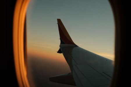 Cityscape of Dubai with skyline and highways at sunset, symbolising planning, logistics, and smooth business travel.